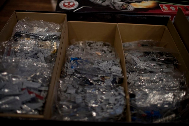Illustration for article titled LEGO's Ultimate Collectors Millennium Falcon Unboxed, Now Shipping with 4-pound Manual
